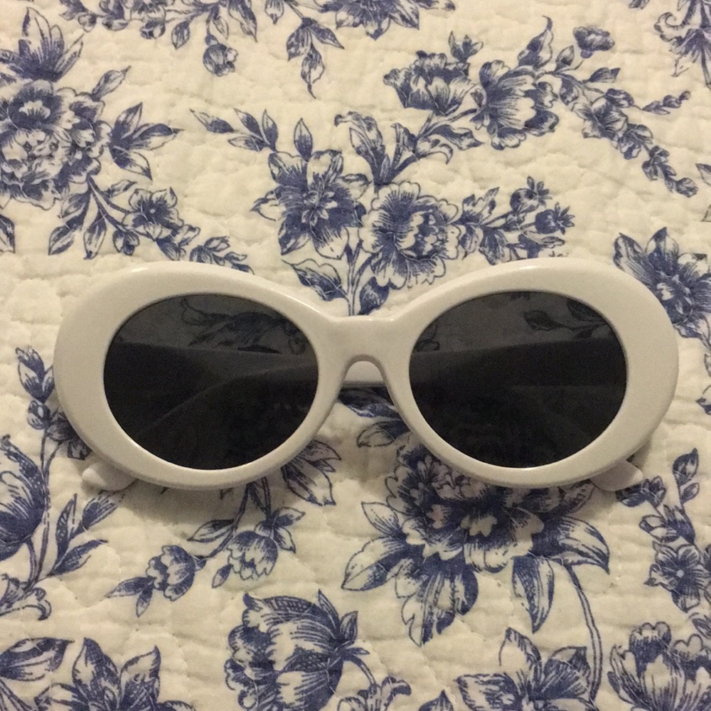 “Clout Goggles” or white sunglasses